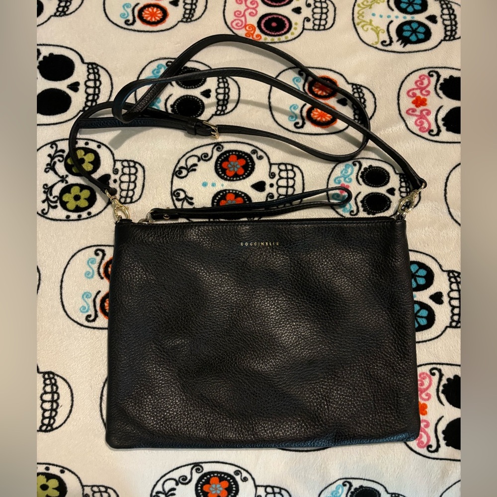 Coccinelle black leather cross body bag with gold hardware